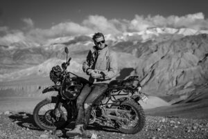Cory Richards Instagram - I’ve known Ben Ayers @jetbutterflies for over a decade. He’s a Kathmandu staple and has called Nepal home for twenty some years. He came for the mountains and stayed for the people, starting and running non-profits for pieces of the community. At his heart, he’s an artist and filmmaker. He’s also a ferocious writer. I’ve been to Mustang with him before on assignment for NG. But this trip is just for us. The following posts are his words.
 
Our other companion is Todd Hoffman. He doesn’t use Instagram. He’s one of those leather-faced legends of the eighties who lived hard and fast enough to know when to leave the racetrack. Even if you hardly know him, you want him on your team. At your back. If he looks familiar, it might be from that one time he took Pepsi to task over a Harrier jump jet.
 
The following posts are from our motorcycle trip from Kathmandu to Lo Manthang. @vacheronconstantin @aetherapparel