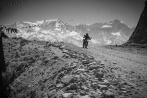 Cory Richards Instagram - I’ve known Ben Ayers @jetbutterflies for over a decade. He’s a Kathmandu staple and has called Nepal home for twenty some years. He came for the mountains and stayed for the people, starting and running non-profits for pieces of the community. At his heart, he’s an artist and filmmaker. He’s also a ferocious writer. I’ve been to Mustang with him before on assignment for NG. But this trip is just for us. The following posts are his words.
 
Our other companion is Todd Hoffman. He doesn’t use Instagram. He’s one of those leather-faced legends of the eighties who lived hard and fast enough to know when to leave the racetrack. Even if you hardly know him, you want him on your team. At your back. If he looks familiar, it might be from that one time he took Pepsi to task over a Harrier jump jet.
 
The following posts are from our motorcycle trip from Kathmandu to Lo Manthang. @vacheronconstantin @aetherapparel