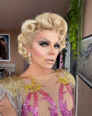 Courtney Act Instagram - This year’s Mardi Gras look and I didn’t get a single full length photo! A gorgeous @marcosquared top and sexy crystal chainmail skirt by @olivia_deur_couture. I was going to wear the same skirt to the after party but when I realized it had 7 hook & eyes, 2 pop studs and a zip! I didn’t like my chances of getting back into at 3am after peeing in the Hordern toilets! I had a less structured version made on a belt for the after party which you can see in the last I wore until after sunrise.