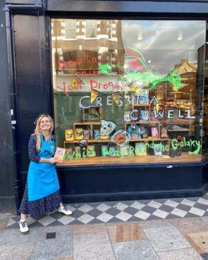 Cressida Cowell Instagram - Here with lovely booksellers at the windows I painted for the Which Way Round the Galaxy book tour …in @Waterstones High Street Ken, Wimbledon, and Clapham. I signed loads of copies of the Which Way books but also Dragons and Wizards books if you live in any of those areas and like a signed book for yourself or as a present…

We ran out of time for me to paint the window of Waterstones Kingston, which was such a shame, because it’s such a beautiful store! (Note to self, four windows in one day a little tricky!) BUT here with wonderful booksellers in that store, and we signed loads of copies so if you live nearby…

@waterstoneskingston 
#❤️📚
#readingismagic
#Waterstonesminitour