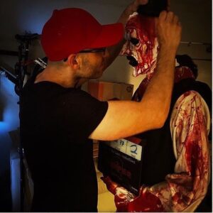 Damien Leone Instagram - That fuckin’ hat — Love the pic! @thesahshow 🔥🤘🏻#terrifier2 #arttheclown #terrifier #blood #bloody #horror #slasher
