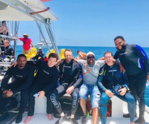 Damon Wayans Jr. Instagram - Scuba-diving w/ sharks and these sacks of flesh 🦈🦈🦈🦈🦈
#SharkWeek 
Side note: i pooted while this pic was being taken. Hence Adam’s lean-away. 
I felt the fart move up my back, out my wetsuit, and hit the back of my head.