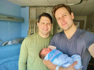 Dan Amboyer Instagram - Surprise! Introducing our daughter, Phoebe. She came early at the beginning of last month, but now that we’ve arrived at her due date, we wanted to share the news. Teddy is a doting big bro, and Eric and are very proud of our little family. 🙏 #twodads 🌈