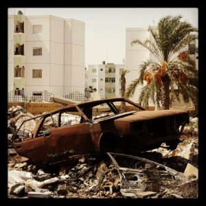 Dan Rather Instagram - A shot of damage outside one of Muammar Gadaffi's bases in Tripoli after NATO bombing. It was taken during our investigation into the dictator's last days. https://itunes.apple.com/us/tv-season/gaddafis-last-day/id485436827?i=573020994 #Libya #Gadaffi #dictator
