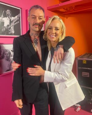 Daniel Johns Instagram - It was a pleasure showing the amazing @bickmorecarrie the Past, Present & FutureNever exhibition in Melbourne last Thursday. Catch us on @theprojecttv talking about life and music tomorrow at 7pm on @channel10au 

The brilliant @george_rose created this technicolour backstage area with @eddiezammit - it was trippy sitting on my old road-cases and talking with Carrie- our chat gets a bit deep but it’s also a lot of fun.

💜