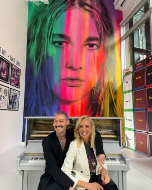 Daniel Johns Instagram - It was a pleasure showing the amazing @bickmorecarrie the Past, Present & FutureNever exhibition in Melbourne last Thursday. Catch us on @theprojecttv talking about life and music tomorrow at 7pm on @channel10au 

The brilliant @george_rose created this technicolour backstage area with @eddiezammit - it was trippy sitting on my old road-cases and talking with Carrie- our chat gets a bit deep but it’s also a lot of fun.

💜