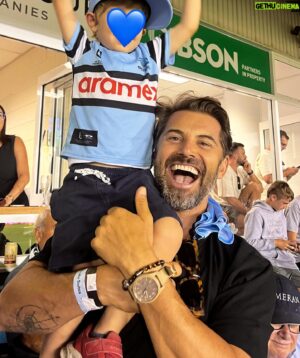 Daniel MacPherson Instagram - HUGE day of sport for the MacPherson Boys

A 7am start for @liverpoolfc on fire at Anfield against @acsparta_cz 

The tonight Austin, Poppy Keith and myself hit Shark Park for a @cronullasharks second half routing of the @nrl_bulldogs 

Makin’ Memories ♥️💙🖤

Have a great weekend Team 💪🏼🦈💥

#UpUpCronulla #Nrl #Sharks #YNWA #LFC