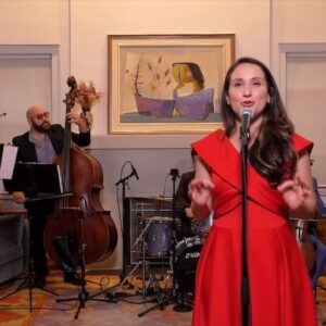 Daniella Rabbani Instagram - 🎼🕎MY BEAUTIFUL FRIENDS!!!!!!! In all your advocacy, all your concern, all your rightful upset DON’T FORGET JEWISH JOY. It is available to us, all of us, through song and language and culture. It is baked into the fabric of our being to celebrate this life we’ve been gifted. Happy Chanuka beloveds!!!! Thank you to @musictalksconcerts for this production featuring me and guest vocalist Inbar Goldman. 🕎🎼
.
.
.
#chanuka #happychanuka #yiddish #jewishandproud