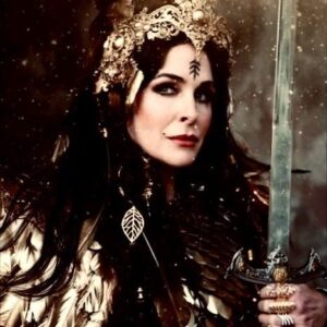 Danielle Bisutti Instagram - "Meet the Valkyries Valentine week!" 
Today, our spotlight is on Danielle Bisutti. 
You can find her on IG/Twitter/Tiktok: @daniellebisutti 
Danielle played "THE VALKYRIE QUEEN" in 'Song of the Valkyrie'. In the band of faeries she is the vocalist. In the beginning of the music video, she plays the Ukulele. 
As a fierce Valkyrie warrior, her weapon of choice was the Broad Sword. In real life, Danielle is an actress, writer, director, producer, singer-songwriter, and musician. Her relationship status is currently a mystery. Her super powers are cooking, dancing, healing, and intuition. 
In the music video, her signature @maccosmetics #lipstick color is Velvet Teddy. 

Stay tuned, and come back tomorrow to meet our next Valkyrie. Then join us on February 7th @ 7:30pm PST on #youtubelive on our Perfect Timing Productions youtube channel www.youtube.com/@perfecttimingproductions 

Don't forget to enter to #Win a signed poster of all the Valkyries. 
Here's how to enter:
Follow and subscribe to all of Perfect Timing Productions socials.
@perfecttimingprods IG
@PerfectTimingLA on Twitter
YouTube.com/@perfecttimingproductions 

Then please submit at least two different questions for two different Valkyrie to our @perfecttimingprods IG account (you can always ask more on the live) 

Share the music video 'Song of the Valkyrie' and tag us on one of your socials. 

Be on the YouTube Live on February 7th, at 7:30 pm PST and YOU might be the winner! 
Don't miss out! 

#TeamFreya #freya #daniellebisutti #MusicVideo #SongOfTheValkyrie #singer #actress #actorslife #valkyrie #youtube #youtubelive #fyp #contest #reels #share  #ukulele #warrior #valentine #faerie #sword #viral #MACCosmetics 

Valkyrie Costumes Sponsors: 
@thelastfolliescloset @borntorome_ @westerncostumecompany @forthestarsfashionhouse 

Make-up sponsor: @maccosmetics 
Make-up design: @goldiestarling 
Hair design: @serranostudiosla 

Photography credit: @kimwoophotography @jonbangle @nikonkg