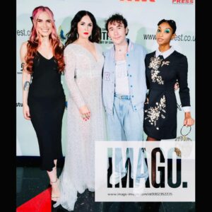 Danielle Bisutti Instagram - “The Blue Rose premiered at London FrightFest and brought otherworldly glamour to the red carpet.” 💙 🌹 

This is just the beginning… 👁️🩸🔪 

📸 @imago.images @alamyltd 
👗 @azazieofficial @michelemariepr 
💍 @pr_solo 
💄 @maccosmetics 
💋 Hair & Makeup @jolandamakeup 

The Blue Rose Red Carpet Credits: 
Written, Directed & Starring - George Baron @sp00kyge0rge 
Produced by Athena Pictures 
@sarena15 @andrapaigegordon 
Line Producer - Nicole Flores 
Cast:
George Baron - “Dalton”
Danielle Bisutti - “Norma Steele”
Nikki Austen Smith - “Sophie”
@nikkoausten 
Sophie Cooper - “Delilah” 
@sophieclarecooper 

Rebecca - “Norma Steele Cosplay” 🔪 💋 
@rebeccacosplaysladyd 

Diana Ferrare-Magaldi - “My mom”💕💝💕
@dianaferraremagaldi 

Thank you to @frightfestuk @clout.pr @icon_pr @joeygirard @bohemiagroup_ @torirobertson__ 

#thebluerose #worldpremiere #normasteele #femmefatale #london #frightfest #indiefilm #redcarpet #filmnoir #surrealism #vintagestyle #actorslife #filmfestival #glamour #azazie #azaziebridalgowns 🤍