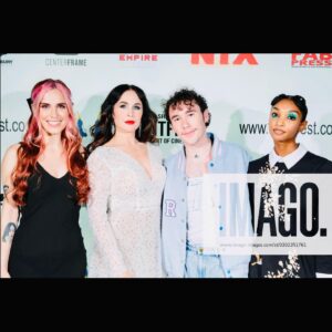 Danielle Bisutti Instagram - “The Blue Rose premiered at London FrightFest and brought otherworldly glamour to the red carpet.” 💙 🌹 

This is just the beginning… 👁️🩸🔪 

📸 @imago.images @alamyltd 
👗 @azazieofficial @michelemariepr 
💍 @pr_solo 
💄 @maccosmetics 
💋 Hair & Makeup @jolandamakeup 

The Blue Rose Red Carpet Credits: 
Written, Directed & Starring - George Baron @sp00kyge0rge 
Produced by Athena Pictures 
@sarena15 @andrapaigegordon 
Line Producer - Nicole Flores 
Cast:
George Baron - “Dalton”
Danielle Bisutti - “Norma Steele”
Nikki Austen Smith - “Sophie”
@nikkoausten 
Sophie Cooper - “Delilah” 
@sophieclarecooper 

Rebecca - “Norma Steele Cosplay” 🔪 💋 
@rebeccacosplaysladyd 

Diana Ferrare-Magaldi - “My mom”💕💝💕
@dianaferraremagaldi 

Thank you to @frightfestuk @clout.pr @icon_pr @joeygirard @bohemiagroup_ @torirobertson__ 

#thebluerose #worldpremiere #normasteele #femmefatale #london #frightfest #indiefilm #redcarpet #filmnoir #surrealism #vintagestyle #actorslife #filmfestival #glamour #azazie #azaziebridalgowns 🤍
