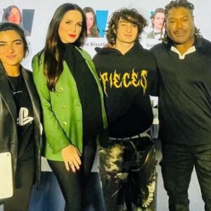 Danielle Bisutti Instagram - What an honor for the Saudi Royal Family to bring us to The Jeddah Book Fair to meet God of War fans. Thank you to Saudi actress and filmmaker Nour Alkhadra @nourtorious_sass for your insightful questions and allowing us to share our game’s message of breaking the cycle, being better, forgiveness and transformation. Thank you to my new friend Mohammed and all the Saudi’s we met for welcoming us with open arms and showing us the best of your coastal city, culture, cuisine and people. I especially loved our visit to Old Jeddah learning about your country’s vast history and petting the cats of Saudi! But what touched me most was meeting the diverse women of Saudi Arabia, who hold a special place in their heart for Freya. You will always have a special place in my heart. 💚 
I wore my @cristallini_official green blazer jacket in honor of your flag 🇸🇦 perhaps I will find myself back on your shores in the future. 
Until then Peace & Love from your Goddess of Love, Freya. 

🧥 @cristallini_official 
👚 @lilysilk 
💍 @sifjakobsjewellery 
Earrings bracelet @cristinacooks (my Auntie! 💞)
👠 @louboutinworld @prada 
👜 @museeyslparis 
💄 @maccosmetics 
🌸 earrings @karo_koru

#godofwar #godofwarragnarok #godofwarragnarokvalhalla #teamfreya #freya #saudi #saudiarabia #saudiroyalfamily #jeddah #jeddahbookfair2023