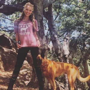Danielle C. Ryan Instagram - Look what just came in the mail!! Thanks @ecodefensegroup !! This shirt is special to me because the concept for it was created on the set of Criminal Minds by some amazing crew members. 
Thanks EDGE for bringing it to life. 
Check out edge’s site to see all the amazing things this organization does for the world and to get your own awesome shirt 🖤(link in bio). Shirt is Indie approved. 
#edge #conservation #africa #wilddog #savetherhino #savetheearth #madcowcollar #criminalminds #shirtdesign #malinois #actor