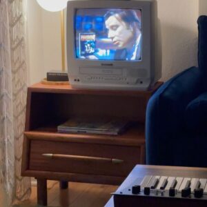 Danielle 'Danz' Johnson Instagram - Y’all old timer CM fans are probably aware that I been obsessed with vintage TVs for a while.

I used to have a whole collection of ‘em just stacked on top of each other in my old music studio (see Amnesia vid). The white Panasonic one (seen in the first photo) was my friend @jer_____________ ‘s that I would borrow constantly for random things like the last @channel9records @synth_history pop-up shop in New York. 

Anyway, I got rid of all the TVs. A lot of them didn’t work anyway or didn’t even have an RCA hookup (I got them for the way the static looks). I also moved into a small studio apartment in Manhattan where I had no space (we’re talking mini-fridge and twin bed type of place, no room for excess non-working TVs).

Needless to say, I finally got another one today. It’s working and I now have enough space for it in my studio here in Glendale.

So here’s to VHS players and analog things. 🖖

First photo snapped by @chadkamenshine.