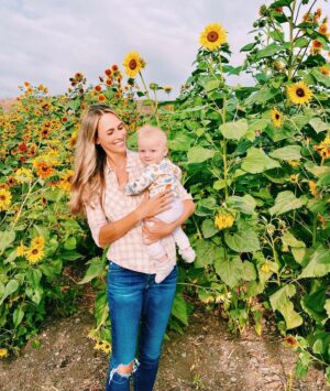 Danielle Demski Instagram - You are my sunshine my only sunshine🌻☀️
.
Did you know sunflowers face eachother when skies are gray? Their powers combined create the energy needed to survive. Whenever you’re having a gray day, turn to the sunflower in your life and find your energy😉🌻😍
.
.
.
.
.
#youaremysunshine #momlife #positivevibes #babyboy #7monthsold #sunflowerfield #findyourhappy