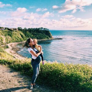 Danielle Demski Instagram - One perk of social distancing is all the quality time I’m spending with my daughter and my husband. We’re taking walks, playing board games, reading, watching movies and...of course, going a little stir crazy🤪 These are our last few weeks as a family of 3 so I’m trying to soak up every minute!
.
What are y’all doing with your time at home??🤔🏡#TogetherApart
.
.
.
#momlife #toddlerlife #9monthspregnant #californiacoast #babybump #beachlife #girlmom #alonetogether #fridayfeels
