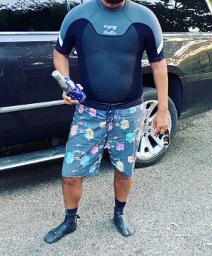 Danny Masterson Instagram - Doing a survey. thumbs up/down. My pal,let’s call him “pal” was wearing his spring suit under board shorts w his ninja slippers. Badass nah/yah?  @kookslams worthy. #shoairbach