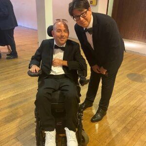 David Holmes Instagram - The BAFTAs last night was a fun adventure. My documentary was nominated but unfortunately didn’t win. I want to congratulate Ellie Simmonds and her team for the well deserved win and also say congrats to every one at the event. It's still unacceptable that I was the only stunt performer in the room and if I’d of won I’d have said something on stage about my department being overlooked. 

Honestly it was fun but unless BAFTA starts recognising stunts I wouldn’t do it again. I didn’t see any other department members who were willing to risk their lives and bodies for the sake of storytelling and I just sat in a room too cold for a quadriplegic surrounded by people from a whole industry who don’t think stunt performers deserve a category.

 #StuntsForBafta  #Bafta #Quadriplegic #NoArmsLegsAnNoVoice #PenguinOnWheels