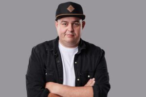 Daz Black Instagram - Merry Christmas. My gift is a picture of me that looks like I’m waiting for the bus.