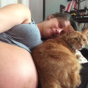 Deanna Russo Instagram - I know death doesn’t give warnings but, boy, does it have a sense of humor. The last words I said to my cat were, “Just go and die already.” Maybe the full moon last night did have as much power as all the astrologers said it would because my words came true. My orange bastard of a cat went and died already. 

He was old and had just pissed on the rug. I was mad so I shoved his nose in his mess and then put him outside, which wasn’t really a punishment. He loved going outside. He had cultivated several names in the many homes he frequented, but in my house, he was The Dude. 

The Dude would abide, but he also had strong opinions about the company I kept. He never warmed up to the kids. I think he considered himself my primary partner and didn’t like sharing my attention. He’d piss in your shoes or shit on your head while you slept if he didn’t want you around. He stood at the helm of my romantic life, the bastard. 

One day while shopping for protection dogs, this determined orange kitten crawled up my pant leg and didn’t leave me alone for the next 15 years. He earned the name because that’s what I shouted every time he charged at his reflection in a floor mirror, cracking his skull against the silver glass, “Dude!” It just stuck. 

The Dude and I were so closely connected before I became a human-mom that I would hold him and sob at the thought of him dying one day. And now that day is today. It was very un-dude of him to piss on my rug because yes, it really did tie the room together, but he did take his own exit, which is something he knew I wanted.