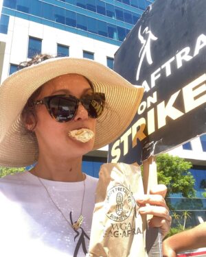 Deanna Russo Instagram - I grew up picketing for American Airlines flight attendants at Newark airport with my mom so union solidarity runs deep here. Highlights of today’s demonstration includes sharing time with one of the most beautiful archetypes of the female form aka @hayleymarienorman AND finally trying my first @shappypretzel (@shappyshaps! We knew one another when 💕). Honorable mention to the vintage Umbro shorts I scored at @banditmke.