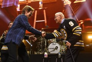 Denis Leary Instagram - Maybe the greatest #ComicsComeHome ever. @alexedelman doing backup vocals on Asshole w @wilfredburr on drums & @marcmaron on lead guitar.  Centennial @nhlbruins cameos during @joanjett Bad Reputation. Plus a ton of cash for @camneelyfdn