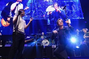 Denis Leary Instagram - Maybe the greatest #ComicsComeHome ever. @alexedelman doing backup vocals on Asshole w @wilfredburr on drums & @marcmaron on lead guitar.  Centennial @nhlbruins cameos during @joanjett Bad Reputation. Plus a ton of cash for @camneelyfdn