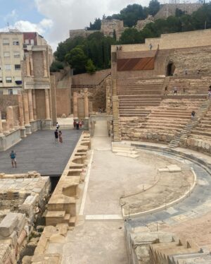 Denis O'Hare Instagram - This is me going full on historical nerd. It's what Hugo calls Denis-ing. We went to La Manga which is a very fun strip of sand in the Murcia region of Spain. We dropped Declan off with our friends and their son and then Hugo and I took off to Cartagena, which is 30 minutes away. I was excited to come here because, I know quite a bit about the Carthaginians and their history in Spain and Hannibal's ultimate showdown with Rome. In our latest play, The Song of Rome, Lisa Peterson and I have a section on Dido and Aeneas. We love Queen Dido - the Carthaginian queen. We first stopped by the Roman amphitheater, which was built at the direction of Augustus. We then visited the remains of the Punic wall and this crazy crypt. I threw in the picture of this amazing tree because of the root.