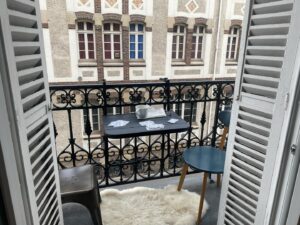Denis O'Hare Instagram - Morning cards on the balcony. Declan kept saying how this was so French. The little balcony, the geraniums behind us, the small little table, the sounds of sirens and motorcycles on the main street. Our dog at our feet looking at all the passersby on the street below.