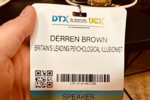 Derren Brown Instagram - Keynoting the HELL out of @dtx_series in Manchester, a big expo on tech. Talking about happiness, Stoicism, meaning (all the good stuff) and we got into AI. Also my lanyard, which is now how I always introduce myself at social gatherings. Interviewed by the ace Sherelle Fairweather. Thanks for having me @rivamedia and @wearetruetalent and the good peeps of Manchester.