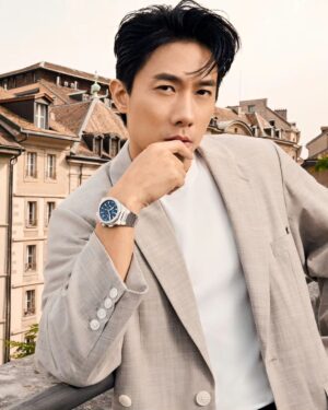 Desmond Tan Instagram - I'm already longing for Geneva! 🇨🇭 

If I had to pinpoint my zenith moment, it would undoubtedly be my inaugural trip to Watches and Wonders with @zenithwatches! I immersed myself in Zenith's rich heritage and aspired to the stars of its vision. 

Sporting the latest DEFY Skyline Chronograph serves as a poignant reminder to cherish our past achievements while relentlessly pushing boundaries to create anew, much like an actor perfecting their craft. 

The 42mm steel case represents a modern reinterpretation of the original DEFY's octagonal design, complete with a multi-sided bezel. The revolutionary 1/10th of a second #ElPrimero 3600 automatic movement breathes new life into the timepiece! 

This isn't just a watch; it's a symbol of defying conventions as I pursue my aspirations. 

#Zenith #ZenithWatches #DefySkylineChronograph
#Chronograph #ElPrimero #TimeToReachYourStar #WatchesandWonders