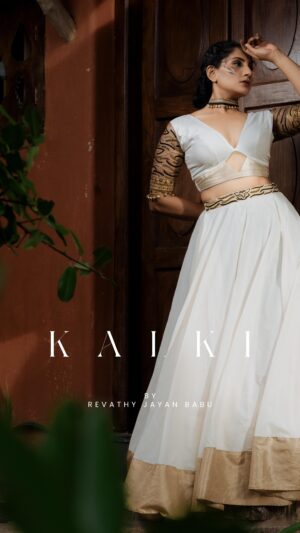 Devaki Rajendran Instagram - From the house of @revathyjayanbabu comes yet another signature collection named KALKI. Inspired by pulikali, the folk dance which is commonly seen during Onam season. Colours black & gold has been intricately interspersed with kasavu & animal prints seen in pulikali. 
Don’t you want your Onam outfit to be unique. DM here to make a purchase from us and also we can customise it according to your preferences too. 
💁🏻‍♀️ @devakirajendran 
📸 @arjunsoorajj ft. @lal_nithin 
💄 @mua_devu_nair_ 
💍 @accesorizewithrevathyjayanbabu 
#wearingRJB #revathyjayanbabu #designerwear #onamcollection