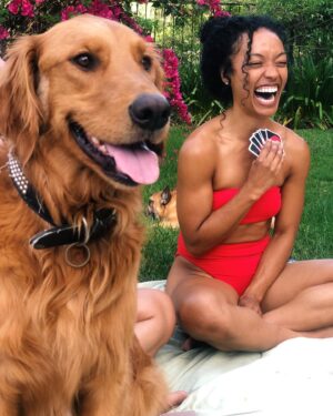 Dominique Domingo Instagram - When your friend is actually trying to capture her dogs cuteness and inadvertently captures your candid happiness ❤️ Who’s cuter though?😏 #HankWins #PhotoBombedHanksPortrait #Pups #Picnics #PlayingCards #PoolDays #Sunshine #Nature #Love #Live #Laugh