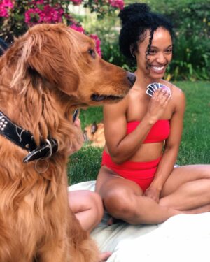 Dominique Domingo Instagram - When your friend is actually trying to capture her dogs cuteness and inadvertently captures your candid happiness ❤️ Who’s cuter though?😏 #HankWins #PhotoBombedHanksPortrait #Pups #Picnics #PlayingCards #PoolDays #Sunshine #Nature #Love #Live #Laugh