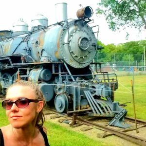 Dominique Swain Instagram - Waiting for the train outside the transplanted Swedish exhibit from the 1904 World's Fair in Lindsborg, Kansas