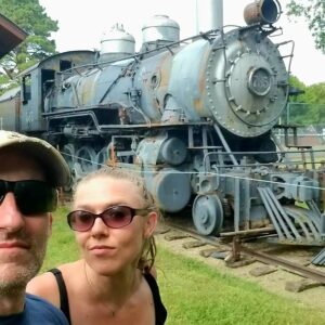 Dominique Swain Instagram - Waiting for the train outside the transplanted Swedish exhibit from the 1904 World's Fair in Lindsborg, Kansas