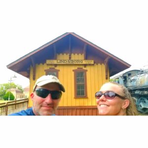 Dominique Swain Instagram - Waiting for the train outside the transplanted Swedish exhibit from the 1904 World's Fair in Lindsborg, Kansas