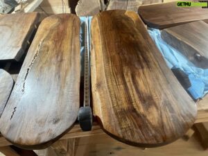 Donal Logue Instagram - Hi. I’m Donal. I’m terrible at social media and photography, but if you want an amazing walnut serving platter or cutting board, hit me up or go to @frisonloguehardwoods and frisonloguehardwoods.com, where these will be listed soon. Oh, and please, give us a follow if you wouldn’t mind! The two center platters are over three and a half feet long, so they are serious heirloom show pieces. If you could see the curl in this grain up close- dang. These slabs were special. We have a ton of walnut logs, so I’m making a heap of them. It’s a time consuming process— Kevin sourcing the logs through his tree service and hefting them up to the mountain, running the logs through the mill, dry kilning the slabs to get their internal temp to 160 to protect them from rot and bugs and to take their moisture content down, flattening them by using a router on tracks where you make a zillion passes and adjust 1/16 of an inch at a time, sanding (and in the case with one of the long platters in the center- taking an exacto knife to sawdust compacted wormholes), and then sealing and staining and/or oiling and beeswaxing. When I get better at stories, I’ll film the process. We ship anywhere in the world and if you are in LA, I do regular runs betwixt there and Oregon. My favorite piece is a Madrone Burl I dado cut to create a traditional Japanese slipper. Madrone is a local species of hardwood here in Oregon- its the favorite of super high end car makers for use in their interior inlays for a reason. Its just incredible wood and is sadly seen by timber companies as a pestilence and burned by the zillions of tons. It’s special, and has a beautiful orangey fire-like glow to it.
