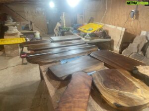 Donal Logue Instagram - Hi. I’m Donal. I’m terrible at social media and photography, but if you want an amazing walnut serving platter or cutting board, hit me up or go to @frisonloguehardwoods and frisonloguehardwoods.com, where these will be listed soon. Oh, and please, give us a follow if you wouldn’t mind! The two center platters are over three and a half feet long, so they are serious heirloom show pieces. If you could see the curl in this grain up close- dang. These slabs were special. We have a ton of walnut logs, so I’m making a heap of them. It’s a time consuming process— Kevin sourcing the logs through his tree service and hefting them up to the mountain, running the logs through the mill, dry kilning the slabs to get their internal temp to 160 to protect them from rot and bugs and to take their moisture content down, flattening them by using a router on tracks where you make a zillion passes and adjust 1/16 of an inch at a time, sanding (and in the case with one of the long platters in the center- taking an exacto knife to sawdust compacted wormholes), and then sealing and staining and/or oiling and beeswaxing. When I get better at stories, I’ll film the process. We ship anywhere in the world and if you are in LA, I do regular runs betwixt there and Oregon. My favorite piece is a Madrone Burl I dado cut to create a traditional Japanese slipper. Madrone is a local species of hardwood here in Oregon- its the favorite of super high end car makers for use in their interior inlays for a reason. Its just incredible wood and is sadly seen by timber companies as a pestilence and burned by the zillions of tons. It’s special, and has a beautiful orangey fire-like glow to it.