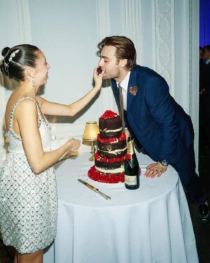 Douglas Booth Instagram - Cutting the cake!!! My favourite chocolate guinness cake made by Bel’s sister @burnt_restaurant accompanied by my very favourite @moetchandon 🥂