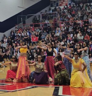 Dr. Meena Singh Instagram - It’s official! Anjali signed with Univ of Michigan! Busy week! Also presented her final senior capstone project and performed in her very last diversity assembly with selections from RRR ✊🏾
#goBlue #bollywooddancer