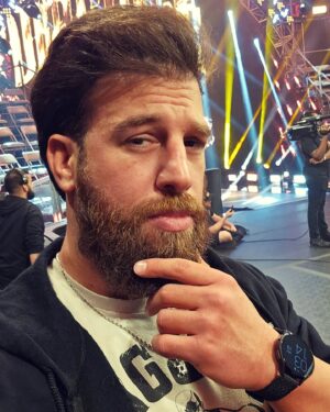 Drew Gulak Instagram - The question was "How's the hair today?"
This was the response.