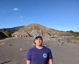 Dwayne Cameron Instagram - Better angle of The Pyramid of the Moon which is located at the western end of the Avenida de Los Muertos (Avenue of the Dead). The Avenue of the Dead is the first thing you see when you enter Teotihuacan and it runs 1.5 miles straight through the city ending at this giant courtyard and the Pyramid of the Moon behind me. The structure of this pyramid looks more like the typical Mesoamerican pyramid you might see in movies with its steep staggered staircases and also like it is often depicted in films The Pyramid of the Moon was indeed used for ritual sacrifices of humans. M-eerie Christmas 😬🎄

#teotihuacan #templeofthemoon