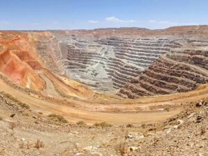 Dwayne Cameron Instagram - Here's a look into the Superpit gold mine in Kalgoorlie, Australia. That mine is 3.5km / 2.2miles long and 1800 feet deep. It's hard to tell how big it is in the second photo but if you're able to zoom in and you see a truck on the road keep in mind those trucks are the size of a large two story family home and weigh a few hundred tons. It's one of the biggest gold mines in the world and can even be seen from space.

#westernaustralia #kalgoorliesuperpit