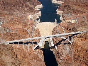 Dwayne Cameron Instagram - The bridge at Hoover dam is called the Mike O'Callaghan Pat Tillman memorial bridge and its 1900ft long and 900ft high and when you see it for the first time when you drive out of the tunnel you realize just how friggin MASSIVE it really is!! 🤯😅 I walked over it and it's a crazy view from the top looking down at the dam. Swipe for aerial view ➡️

#hooverdam #hooverdamnevada #hooverdambridge