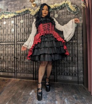 Ebony Bowens Instagram - Thank you so much @atelier_pierrot @atelier_pierrot_english for having me model the Bustle Corset JSK ♥️ Really liked how these photos came out! I can’t decide which color I like the best! モデルさせていただきました🤍　ありがとうございました！🥀

The Japanese elegant gothic lolita fashion community usually doesn’t see someone like me representing brand clothing for lolita. As someone who’s loved egl fashion for almost 20 years, I cannot tell you how proud I am to be a full figured, plus size, thicc, whatever adjective you like to use (lol) black woman modeling for a lolita brand in Japan. This is the type of representation I would’ve loved to see as a child, but sometimes you gotta be the change you wanna see! 💕

Thank you to all the hardworking Japanese and non-Japanese staff at Atelier Pierrot for making the investment and effort to produce high quality lolita fashion clothing in plus sizes. Egl should be for everyone to enjoy regardless of size, race, gender, height, etc. They are taking small steps everyday in the right direction 🖤

#eglcommunity #eglcoord #eglfashion #gothlolita #atelierpierrot #atelierpierrot_style #blacklolita #plussizelolita #harajukufashion #kawaiifashion #jfashion #ロリータ #ロリィタ #ゴシックロリータ #プラスサイズロリータ　#プラスサイズロリィタ #アトリエピエロ