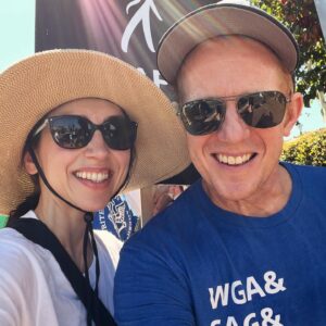 Eden Riegel Instagram - A year of selfies with my sweetie to celebrate the day of his birth! This year has been a toughie. Like, yikes! Sometimes it felt like we were just surviving, and barely at that. But new challenges meant seeing him rise to the occasion and step up for our family again and again. He just keeps finding new ways to make me fall in love with him. Our partnership means we’re never alone facing obstacles, difficulties are more tolerable because they are shared, we have each other to take on burdens when one of us doesn’t feel strong enough. This year I asked Andrew to be funny and silly and let his wit shine even when I’m sad — maybe especially when I’m sad — and he’s found the strength to do it, because I asked. His ability to stay buoyant in hard times is what makes him the backbone of our family. His sense of humor is our secret weapon. There’s no one else on earth I can imagine walking through this life with. It just wouldn’t be this good. Please join me in wishing this wonderful, deserving person a very happy birthday!