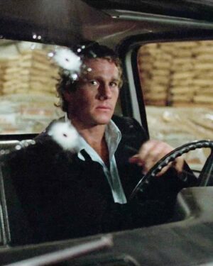Edgar Wright Instagram - “The Driver
 
Lives alone.
Chauffeured getaways for 12 years.
Best Wheelman in the city.
Works off the street.
Never asks a question.
Always wears a dark suit.
And never wears a tie.”
 
This is the opening introduction to Walter Hill’s screenplay and his description of the titular character, The Driver, who would go on to be played by Ryan O’Neal.

I have loved Ryan O’Neal in many films. He was the star of a number of classics and favourites, especially for me: ‘What’s Up Doc?’, ‘Paper Moon,’ and ‘Barry Lyndon.’

But of course, I am obsessed and endlessly inspired by Walter Hill’s 1978 film ‘The Driver,’ a diamond-tight, minimalist masterpiece that unfolds flawlessly over a succinct 91 minutes.

Walter Hill had written the film with Steve McQueen in mind, and after he passed, (“I don’t want to do another car movie”), the script made its way to Charles Bronson and then finally to O’Neal, a super-hot actor at the time, but perhaps not one who you think of as the lead of a tough crime film. And yet, it’s precisely because O’Neal is the more unlikely lead that the character becomes infinitely more beguiling, with the look of faded playboy glamour and an inscrutable, taciturn presence. I truly love O’Neal as this mysterious walking question mark in the centre of this crime story, so much so that it inspired my own script about an unlikely wheelman.

Ryan, thank you for all the great films and the inspiration. RIP.