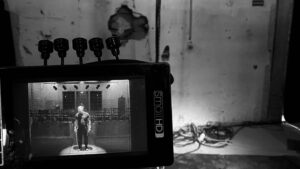 Edward Norton Instagram - I’ve taken a lot of pictures on Wes Anderson’s sets over the years.  These are a few of Key Grip, Sanjay Sami… one of the best in the business and one of my favorite people from Wes’s team.  A great profile of him just came out in the NY Times
https://www.nytimes.com/2023/06/21/movies/wes-anderson-asteroid-city-camera-moves.html?smid=em-share  If you’re a fan of Wes’s films, or of film in general, this is a must read.  This is a really detailed portrait of how critical a great technical collaborator is to the creative process of a film.  Sami also fills the set with positivity & undimmed enthusiasm for the process. Loved & respected in equal measure by all of us. So great to see one of behind the camera team celebrated like this.