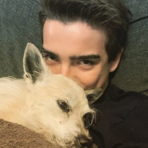 Elias Harger Instagram - Snuggling with my old dog. Sadie is 16 years old. She still can’t drive though. Loser! 😂